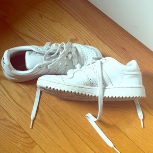 Women’s all white adidas sneakers